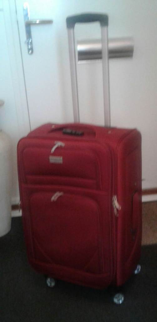 Small Suitcase on 4 Wheels