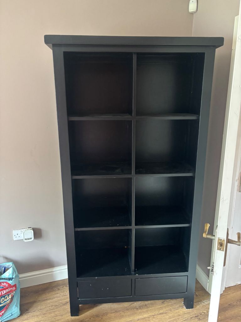 Black shelved unit 