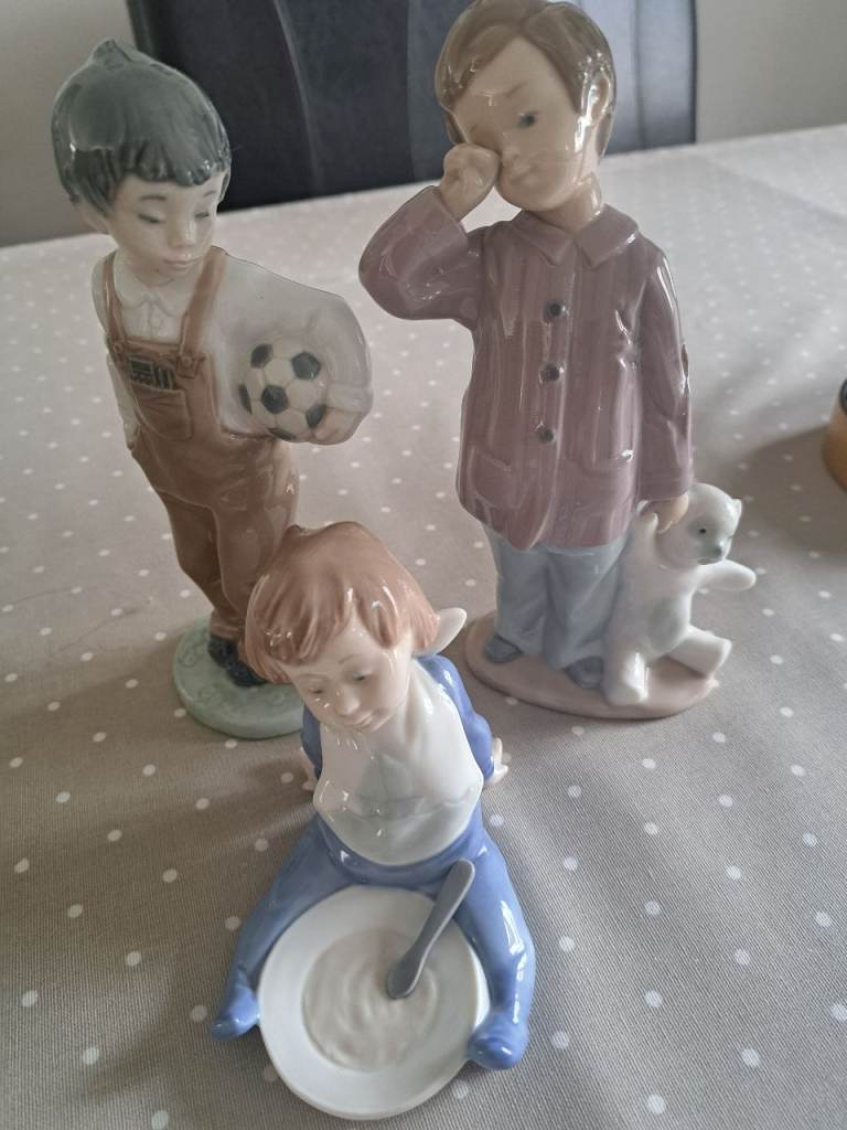 3 Nao by Lladro "little boy" figures 