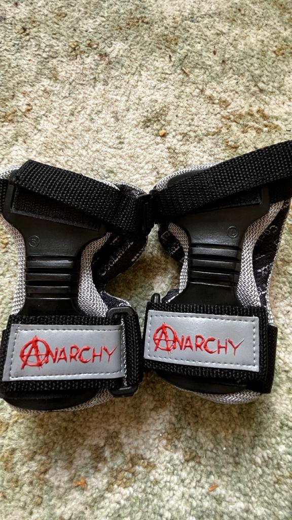 Black Rollerblades UK size 10, with wrist guards 