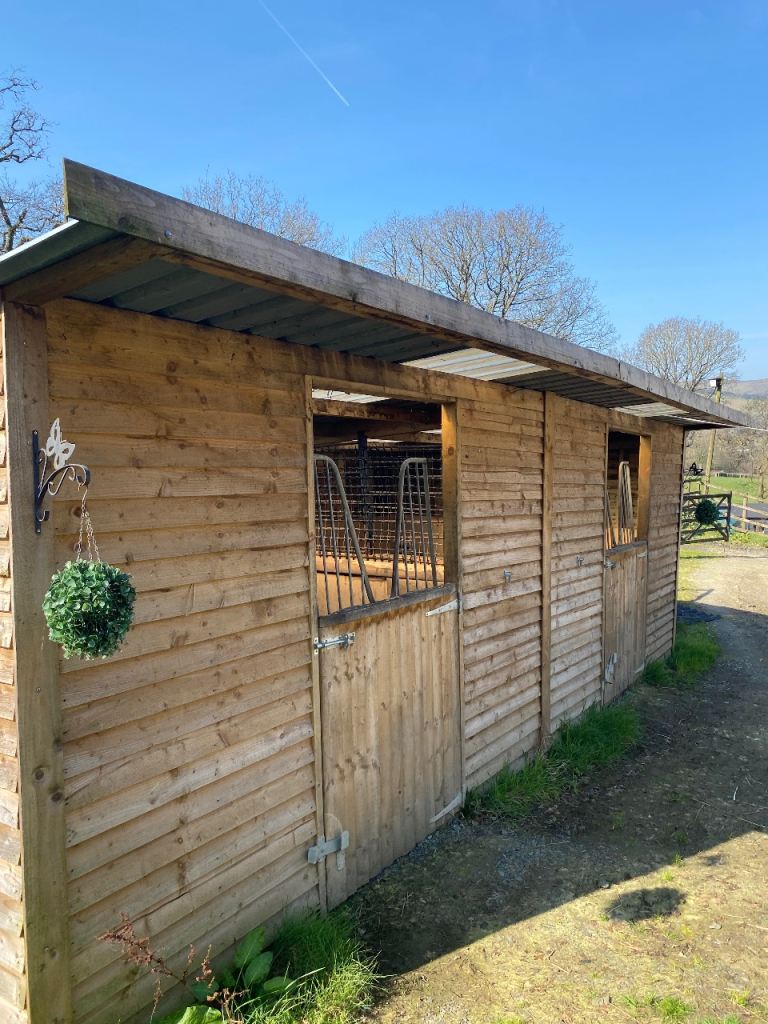 Wooden horse stables