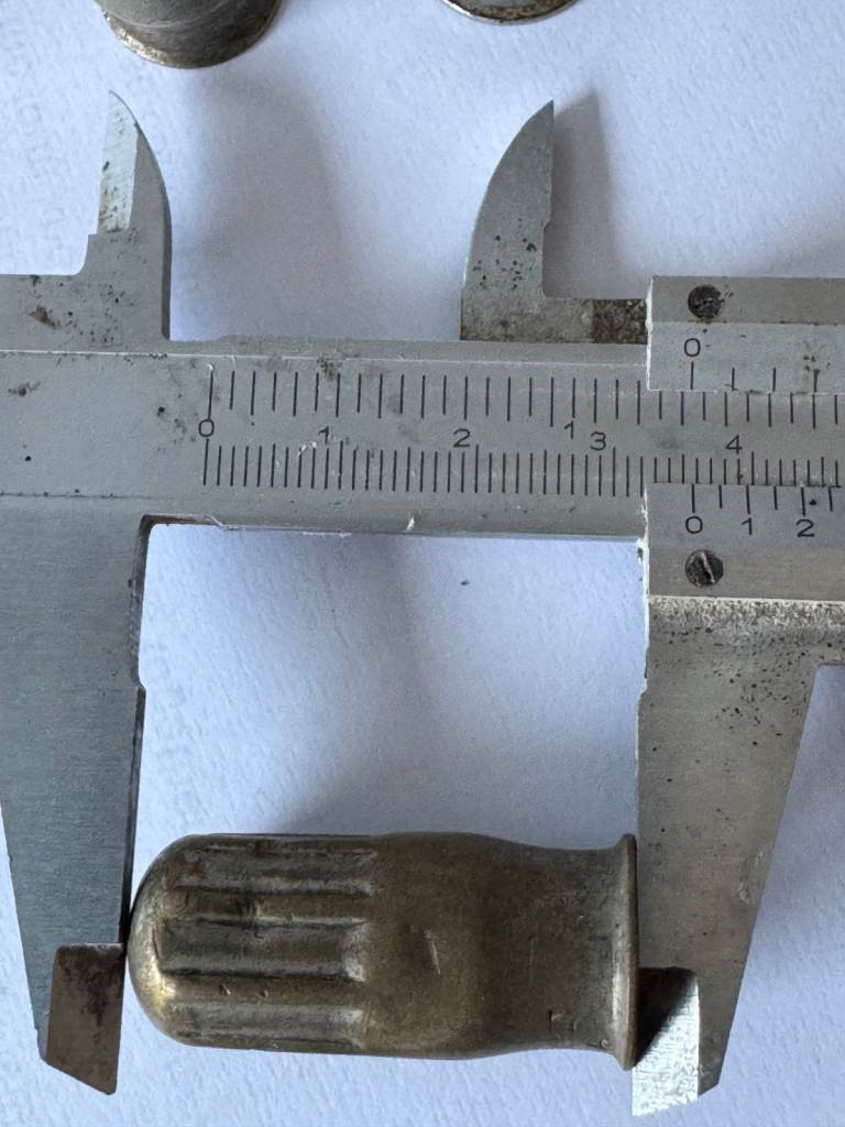 old pre war car tyre  valve caps