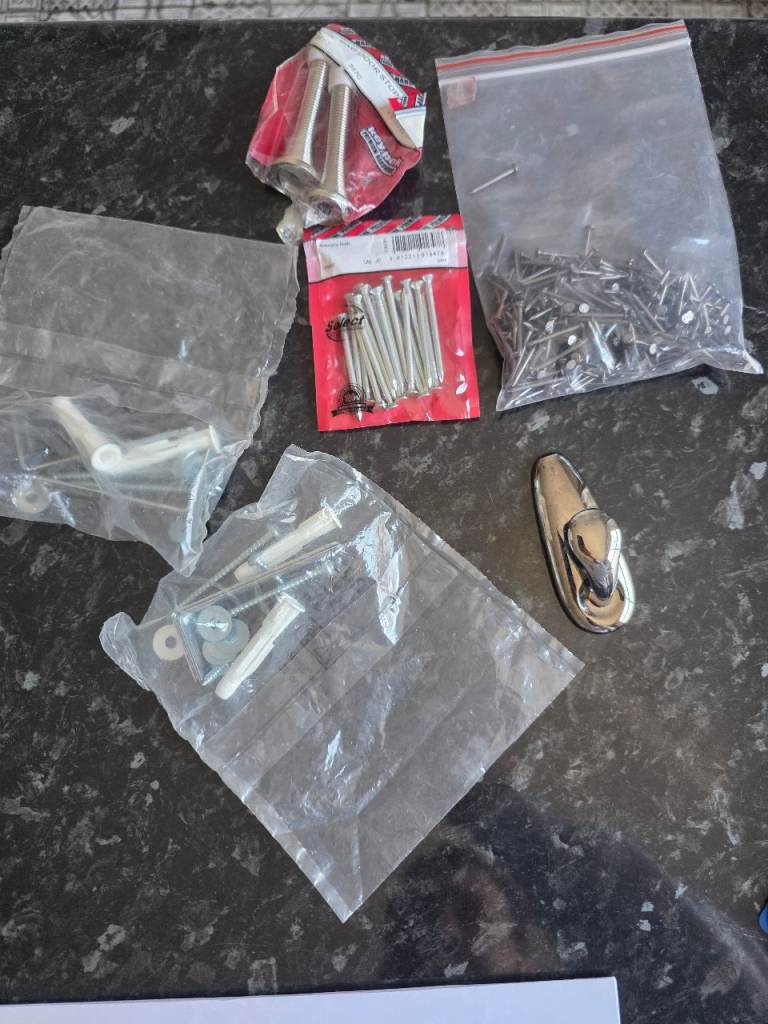 Assorted Screws, Nails, and Wall Plugs – New