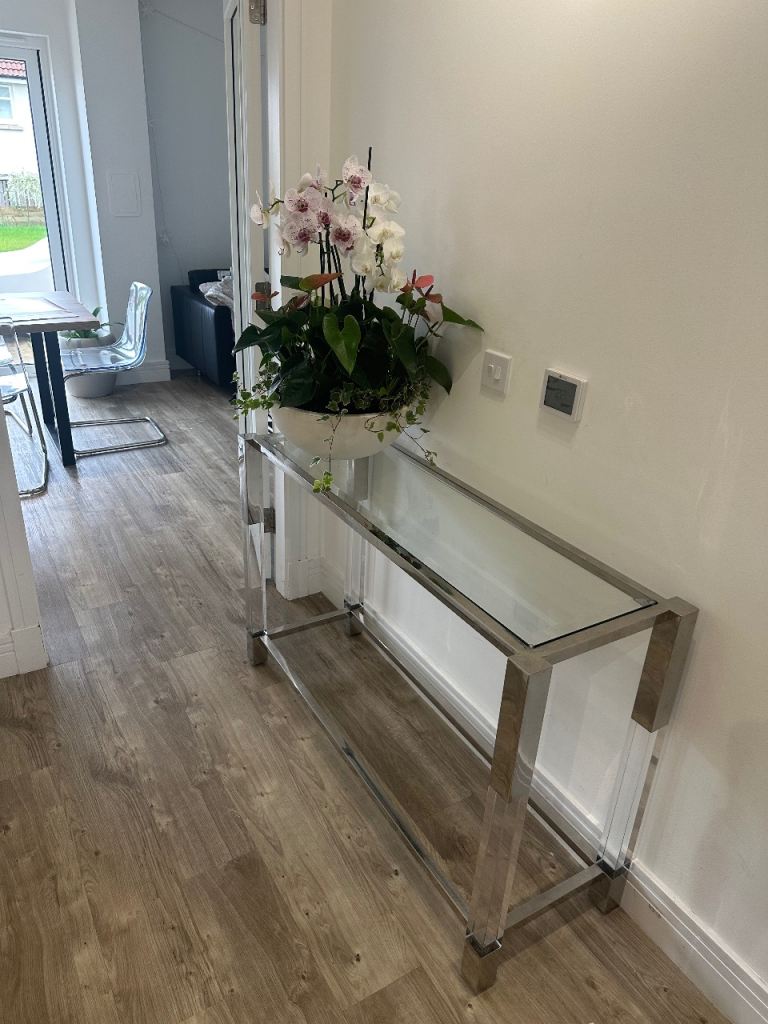 £10.  Expensive designer glass/chrome console 40cm x 120 cm. Will fit in any car with seats down. 