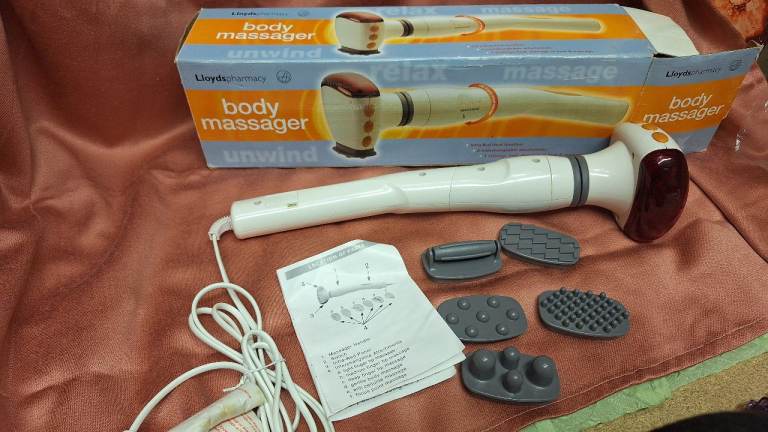 Body massager with infra red heat