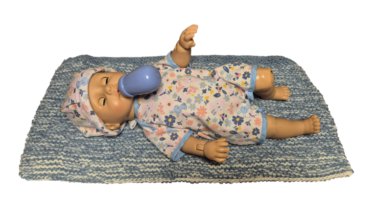 Hard bodied zapf creation jointed doll makes noises cries gurgles etc but no longer crawls