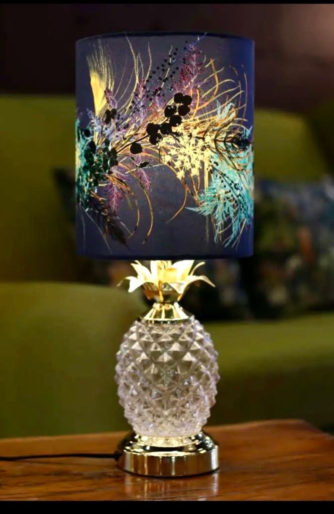 Gillian Arnold Galene’s Dark Floral Print Lampshade And Pineapple Table Lamp