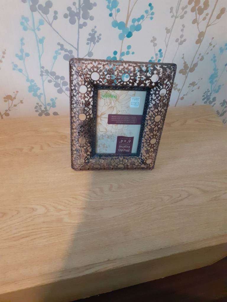 Photo frame. Moroccan style, Bronze coloured metal frame, cut out detailing. 