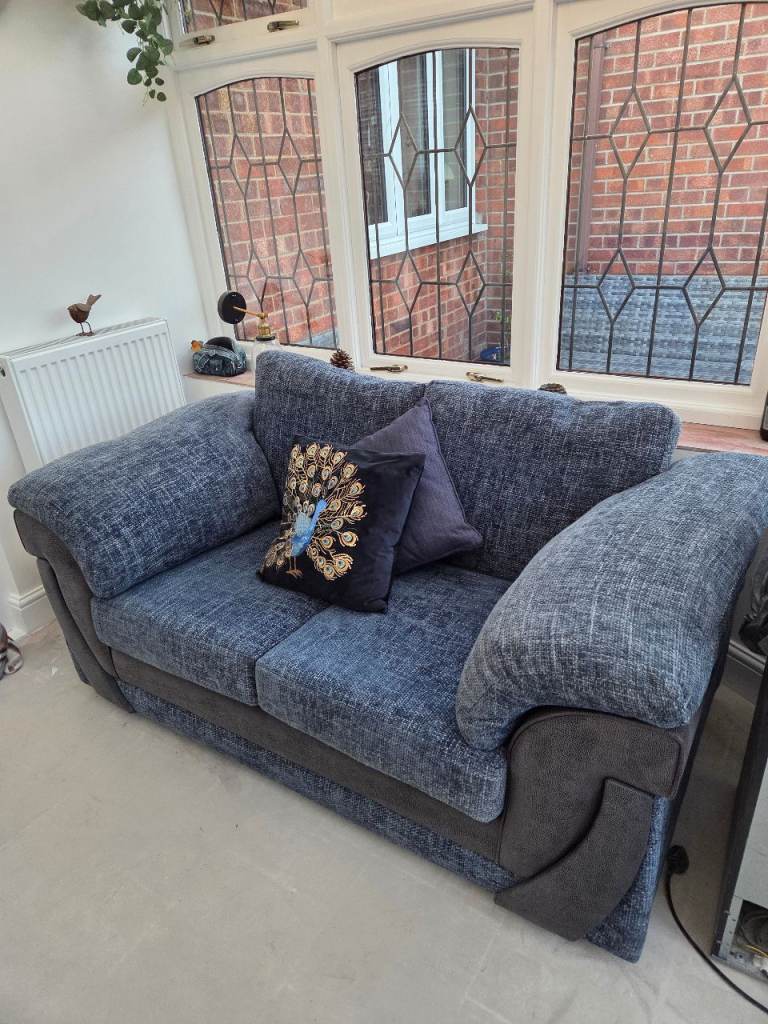DFS 2 seater sofa in navy blue ..