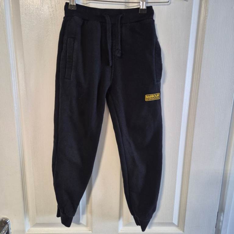 Boys Barbour international black jogging bottoms age 6-7 years good condition 