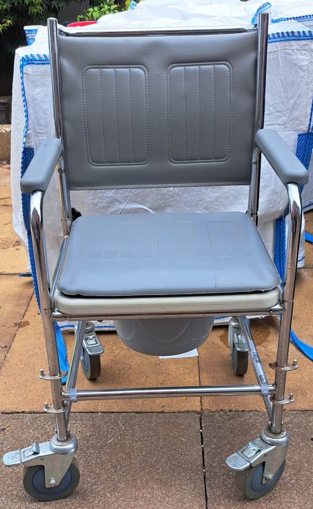 Grey Commode Chair with Wheels – Good Condition