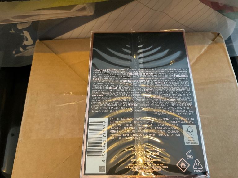 YSL black Opium 90ml eau de Parfum , still in wrappers