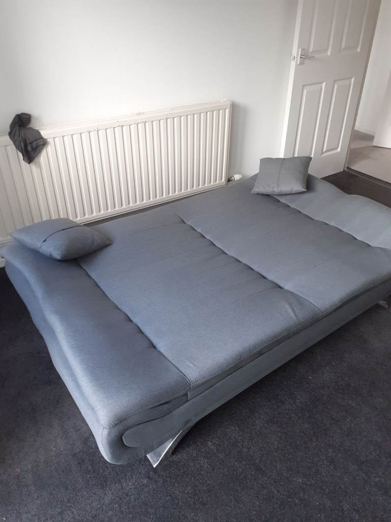 Bed settee practically new