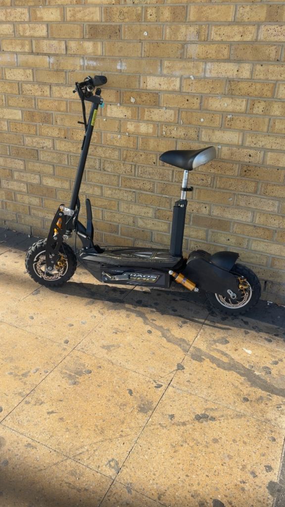 Electric Scooter with Seat – Black, Fair Condition