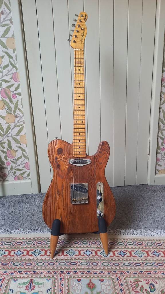 Unique Telecaster style guitar. Built from a 100 year old cider barn.