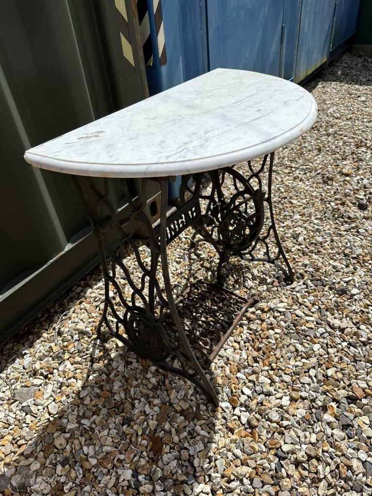 Singer sewing table with marble top. 