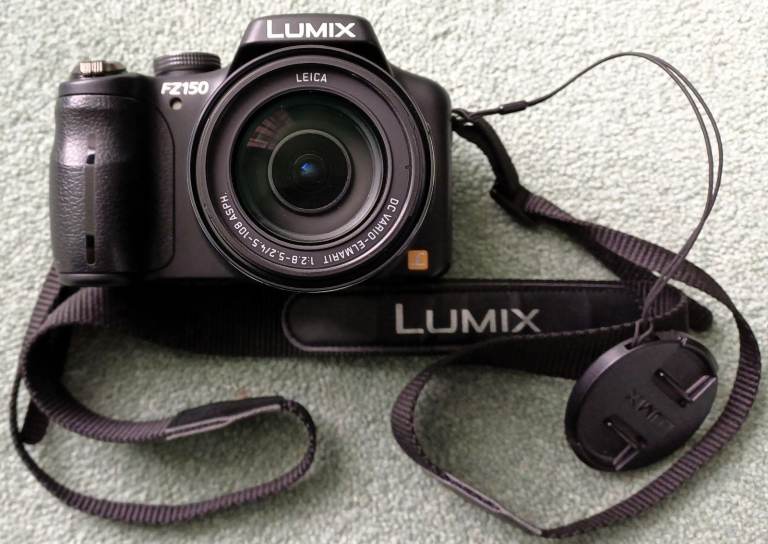 PANASONIC LUMIX DMC-FZ150 BRIDGE CAMERA 24x ZOOM 12.1 MP + PADDED CASE + MANY EXTRAS