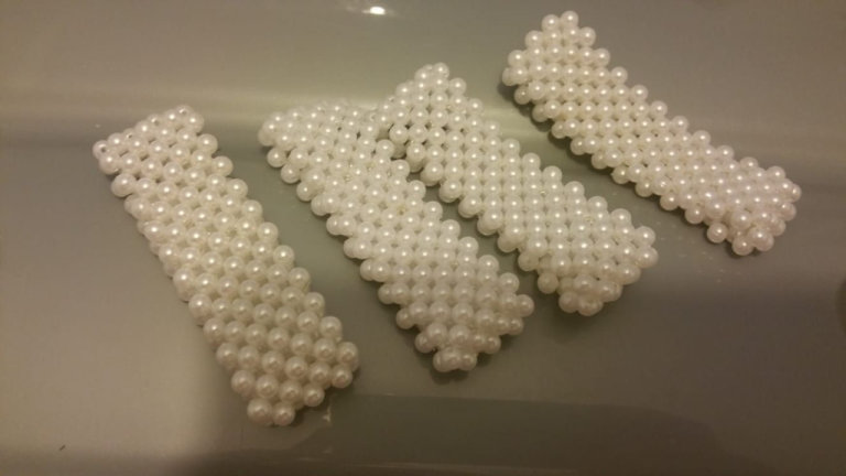 Brand new elasticated pearl effect bracelets