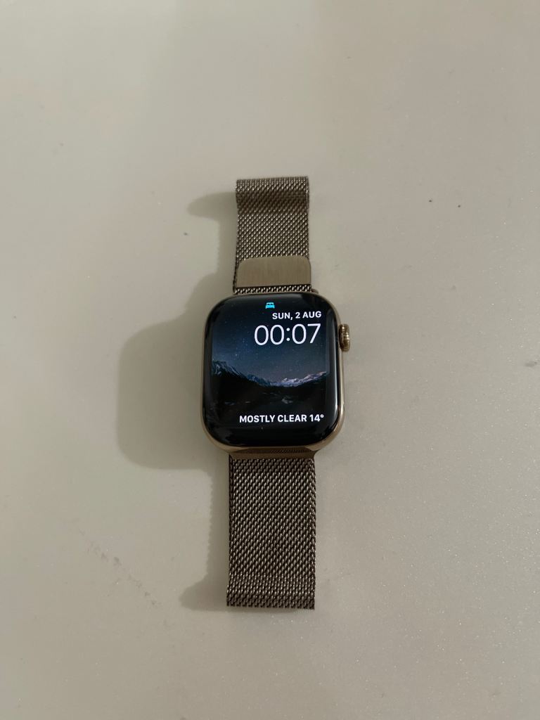 Gold Smartwatch with Milanese Loop Strap – Good Condition