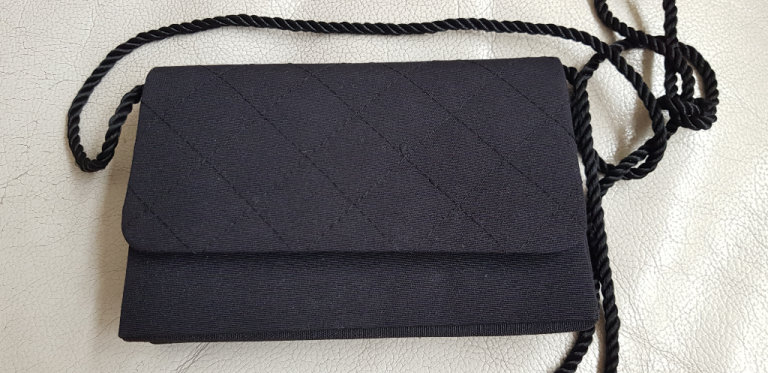 Small black Loreal make-up clutch purse
