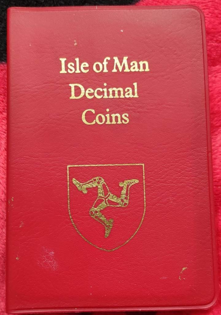 1977 Isle of Man 6 coin set in folder,some coins age toning,Unc