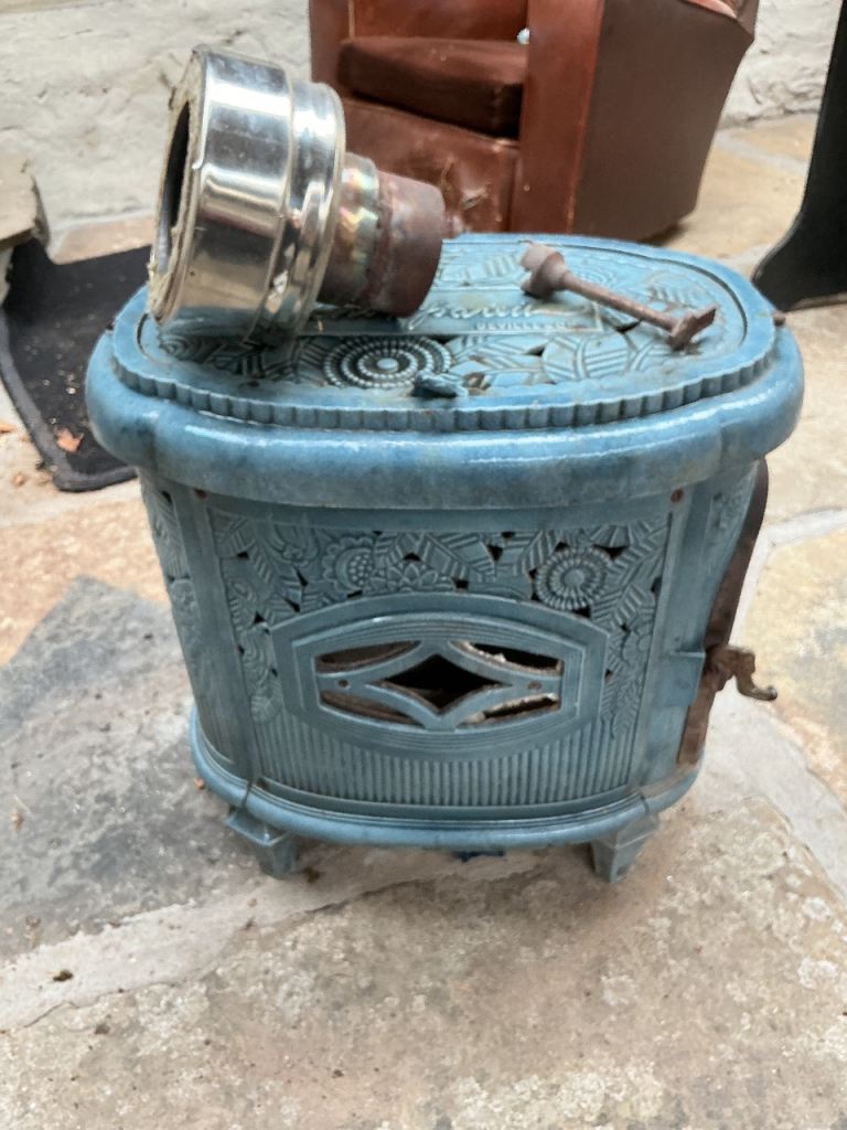 Vintage French cast iron wood burning stove Deville. Colour blue enamel finish