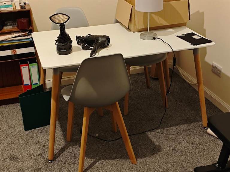 A Table with 4 matching chairs