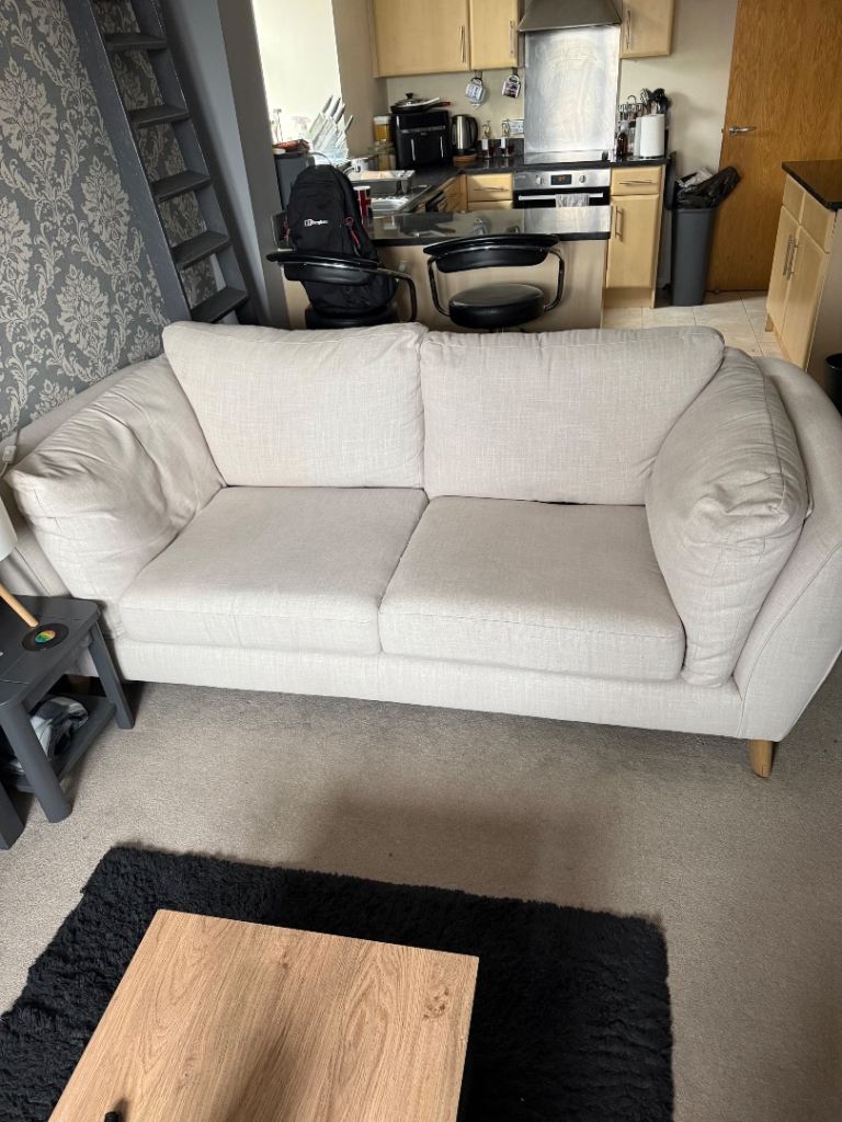 Comfy Cream Two-Seater Sofa – Good Condition