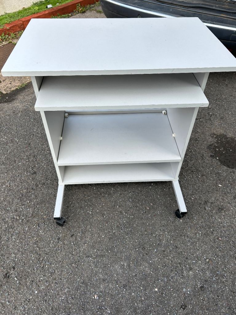 White desk with slide out shelf