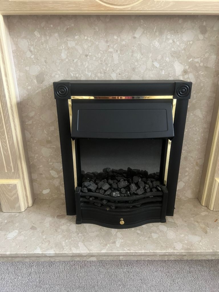 fireplace surrounds with marble backing and lined oak mantle  and hearth.