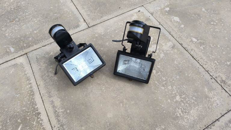 Pair of Outdoor Security Floodlights with PIR Sensors – Good Condition