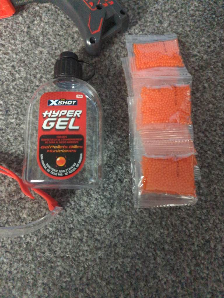 X Shot Hyper Gel gun with glasses 