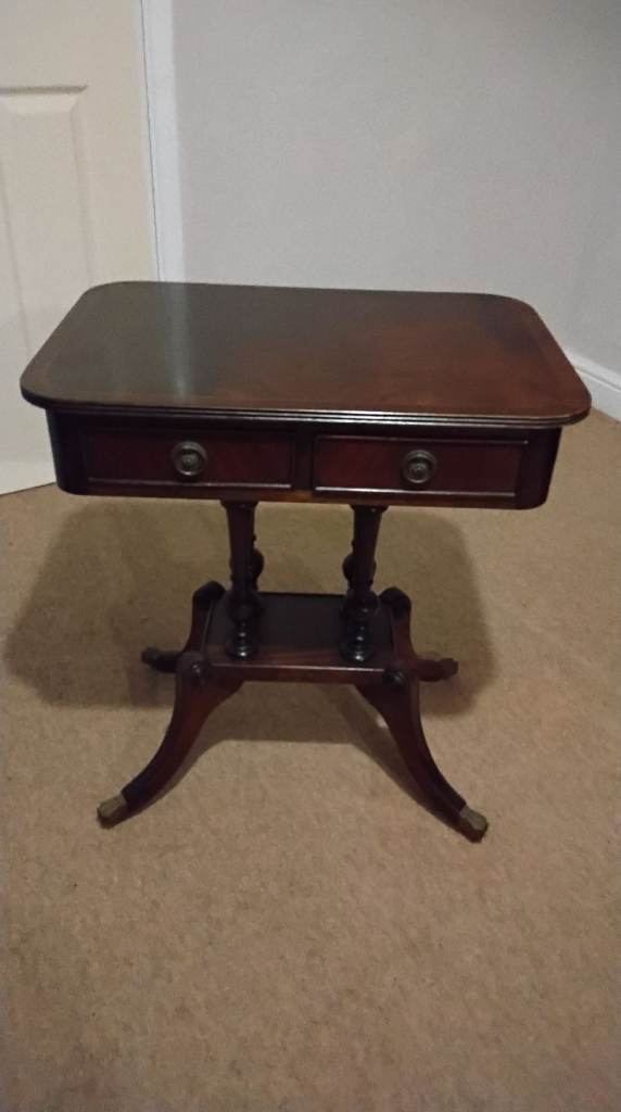 Small Regency Style Mahogany side table with 2 drawers and wheeled antique brass fittings 