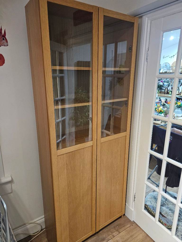 2x beech veneer Ikea Billy bookcases glazed