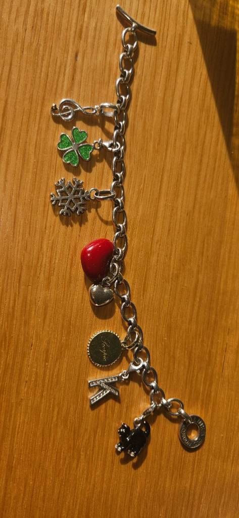 Long of London with charms 