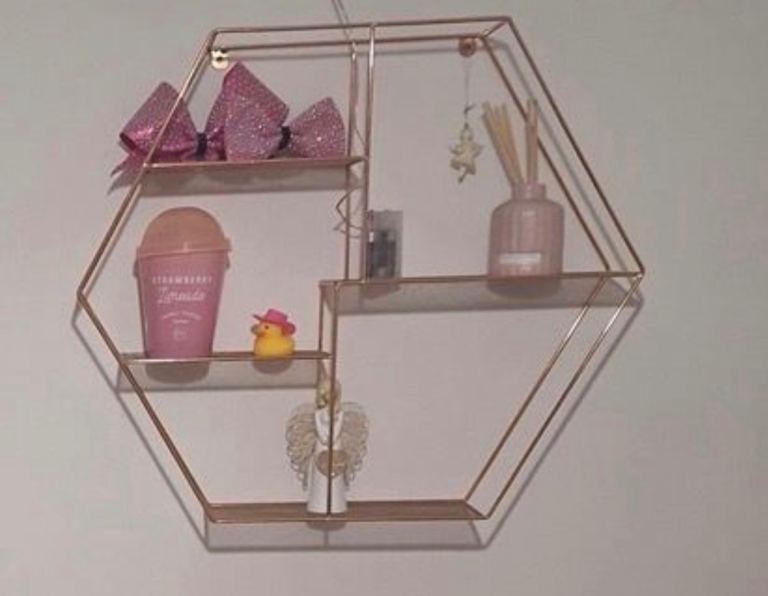 Rose gold wall shelf