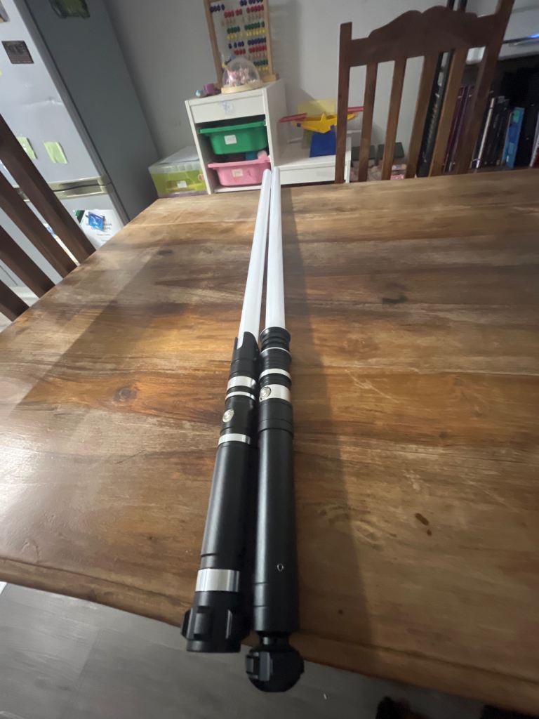 2 heavy proper lightsabers.