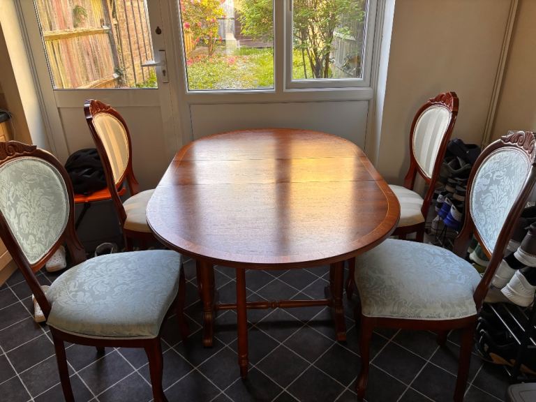 Folding drop-leaf wooden table and 4 chairs