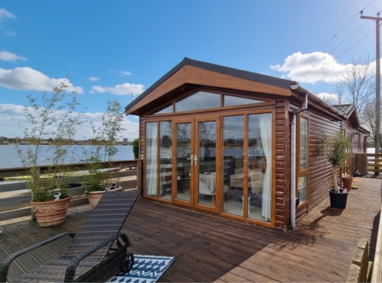 Omar Manhattan wooden 45 x 14 ft lodge 