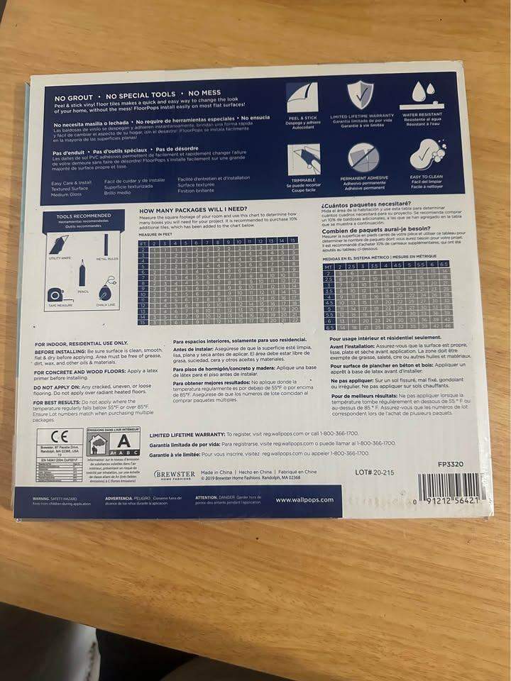 7 packs of 10 12in x 12in FloorPops Peel & Stick Floor Tiles – Ashwood Colour