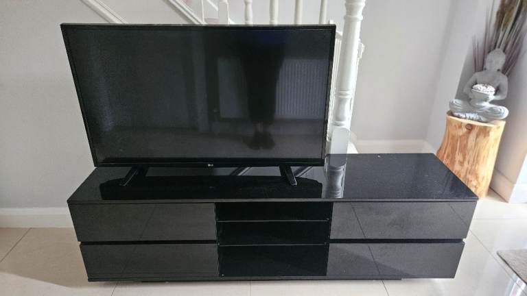 42" Flat screen TV for sale and Black gloss unit