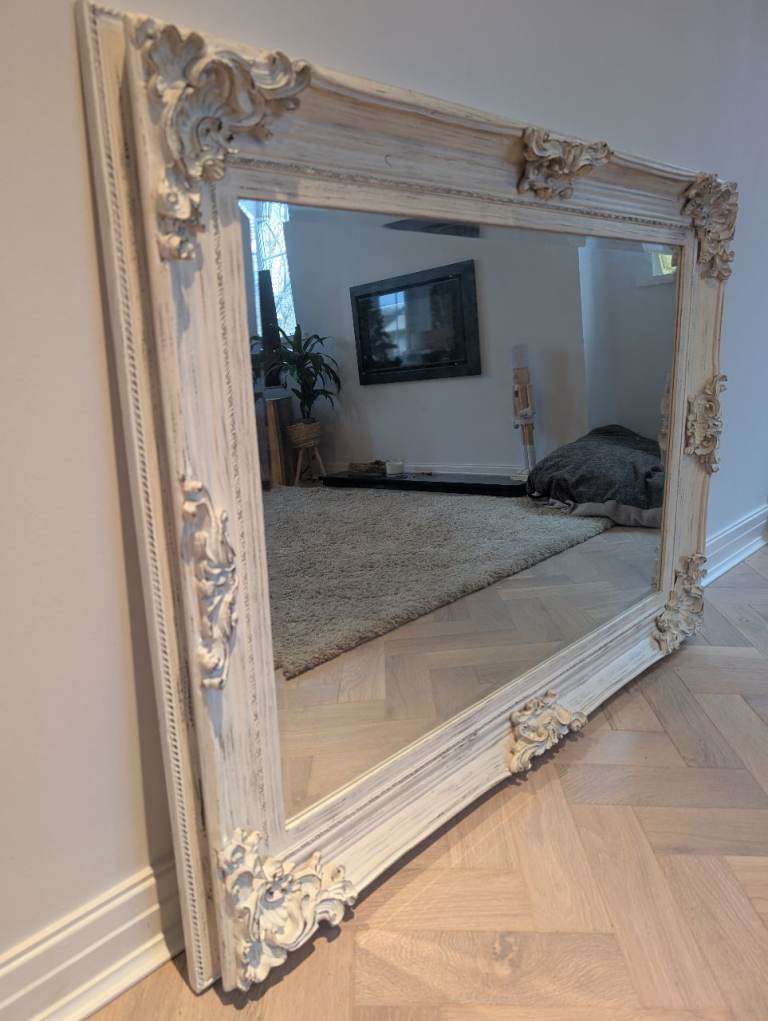 Large white carved antique effect mirror 