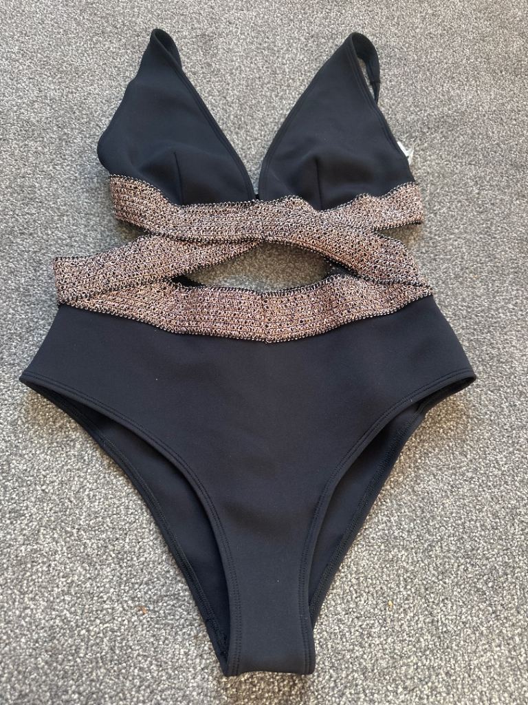 Stylish Black Swimsuit with Sparkle Detail – As Good As New