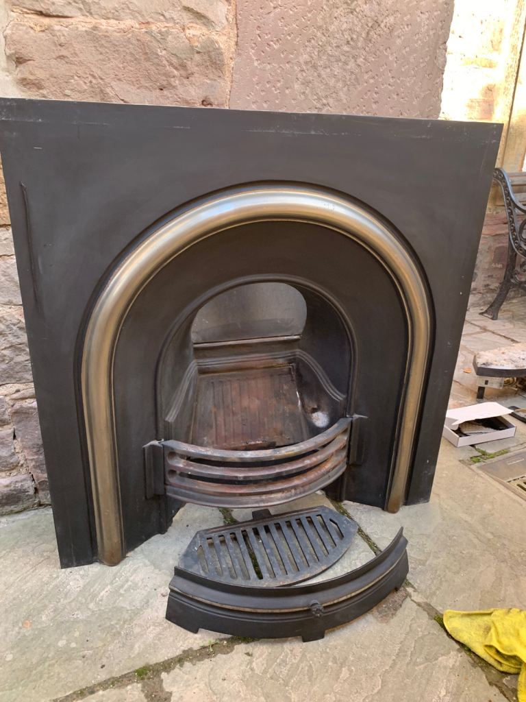 cast iron Celtic arch fireplace insert