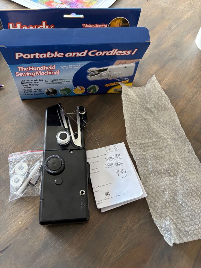 Handheld sewing machine brand new 