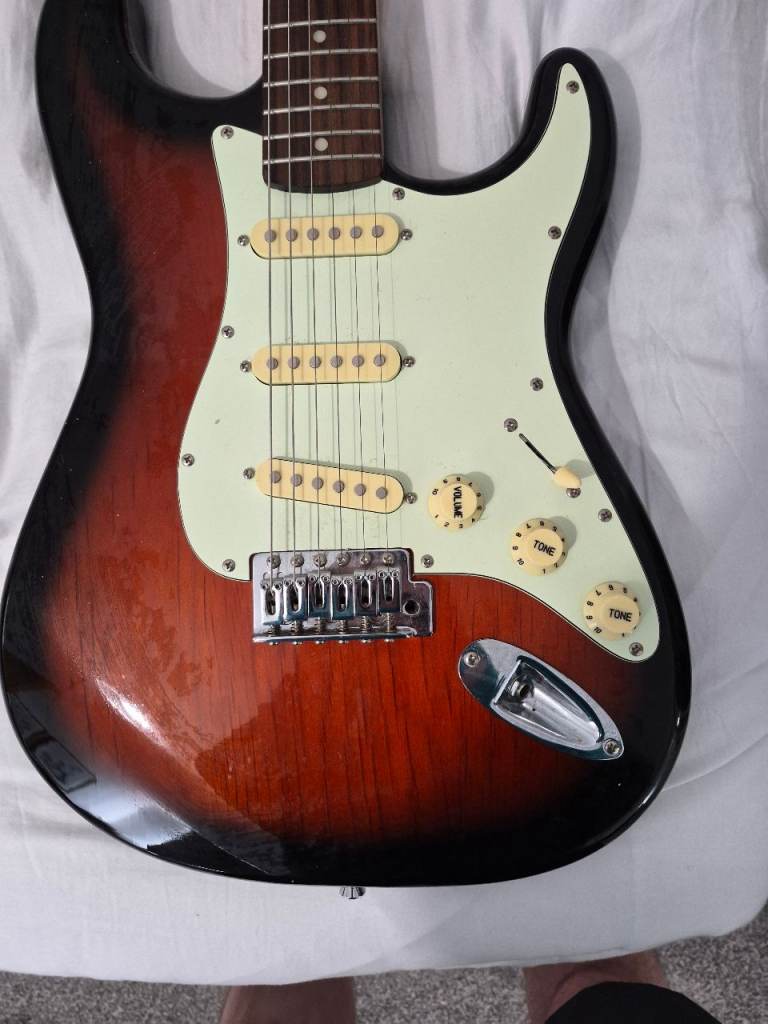 Fender Mustang 1 amp and Jim Deacon Stratocaster 