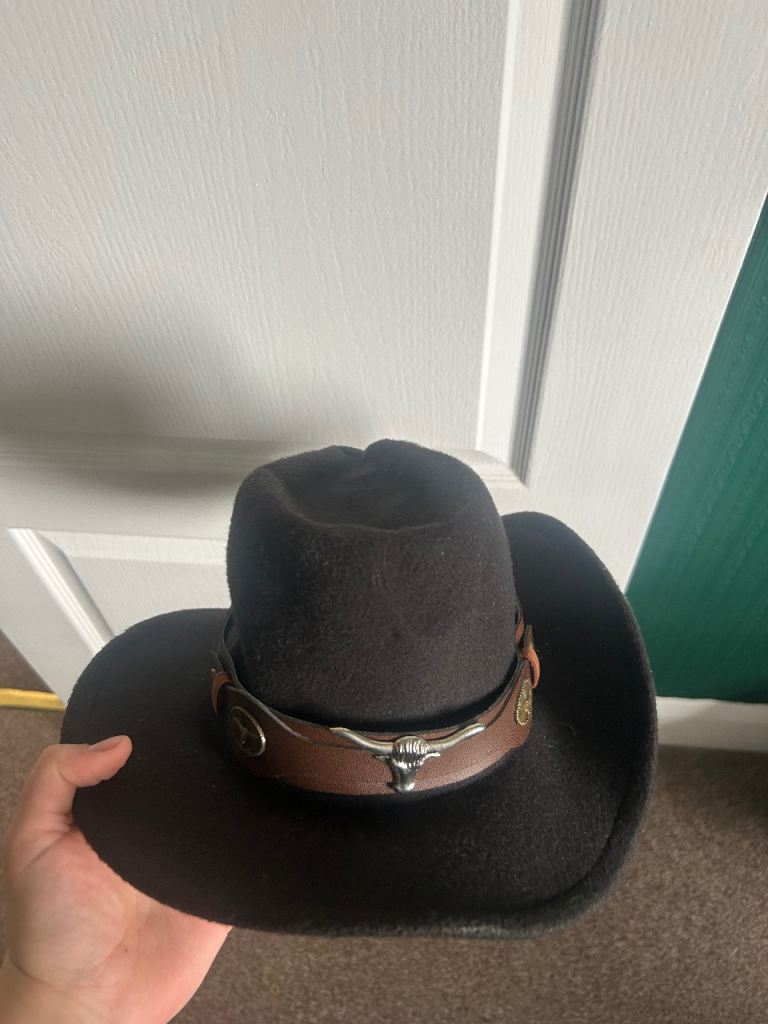 Black Cowboy Hat with Silver Bull Horn Detail
