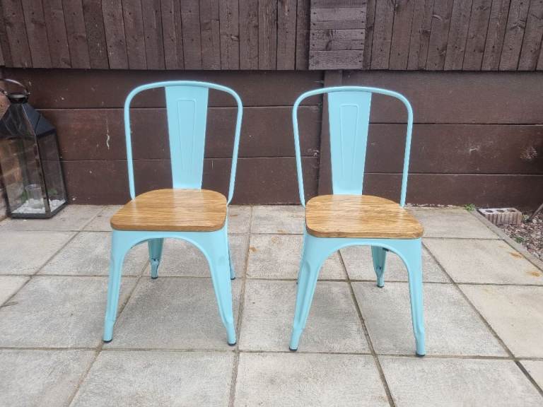 Steel industrial style chairs with wooden seats