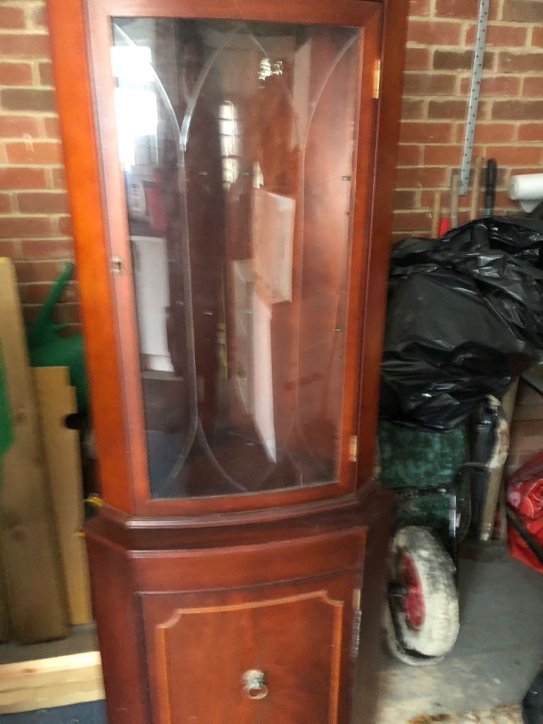 Tall wooden glass corner cabinet