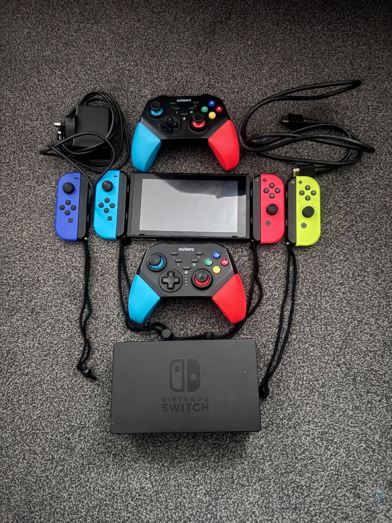 Nintendo Switch Console with Dock and Multiple Controllers